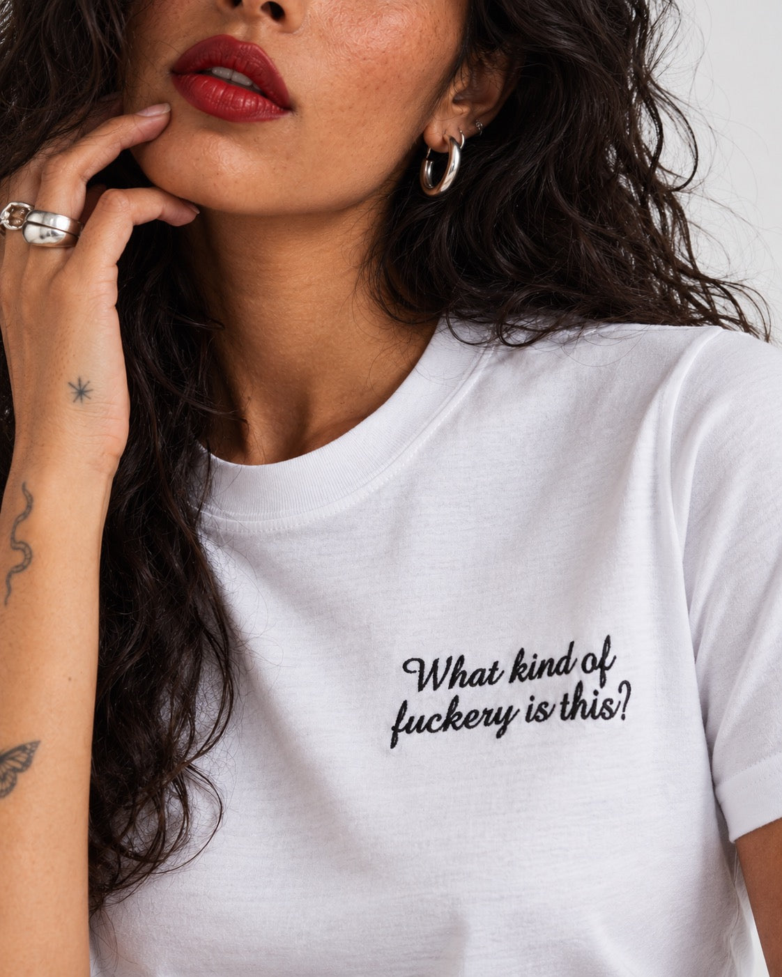 Women's 'WHAT KIND OF F CKERY IS THIS?' left chest embroidered premium organic medium fit 'Muser' t-shirt