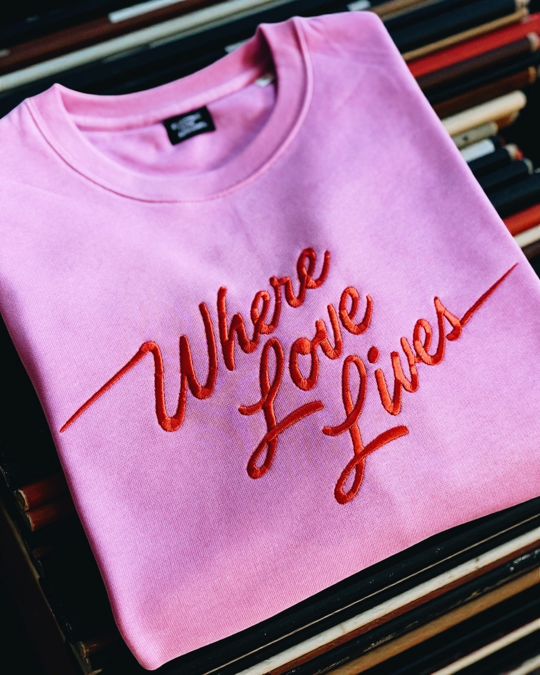 'WHERE LOVE LIVES' 90s lyric embroidered organic women's dropped shoulder 'alma' sweatshirt