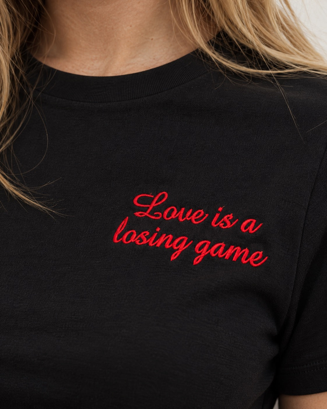 Women's 'LOVE IS A LOSING GAME' left chest embroidered premium organic medium fit 'Muser' t-shirt