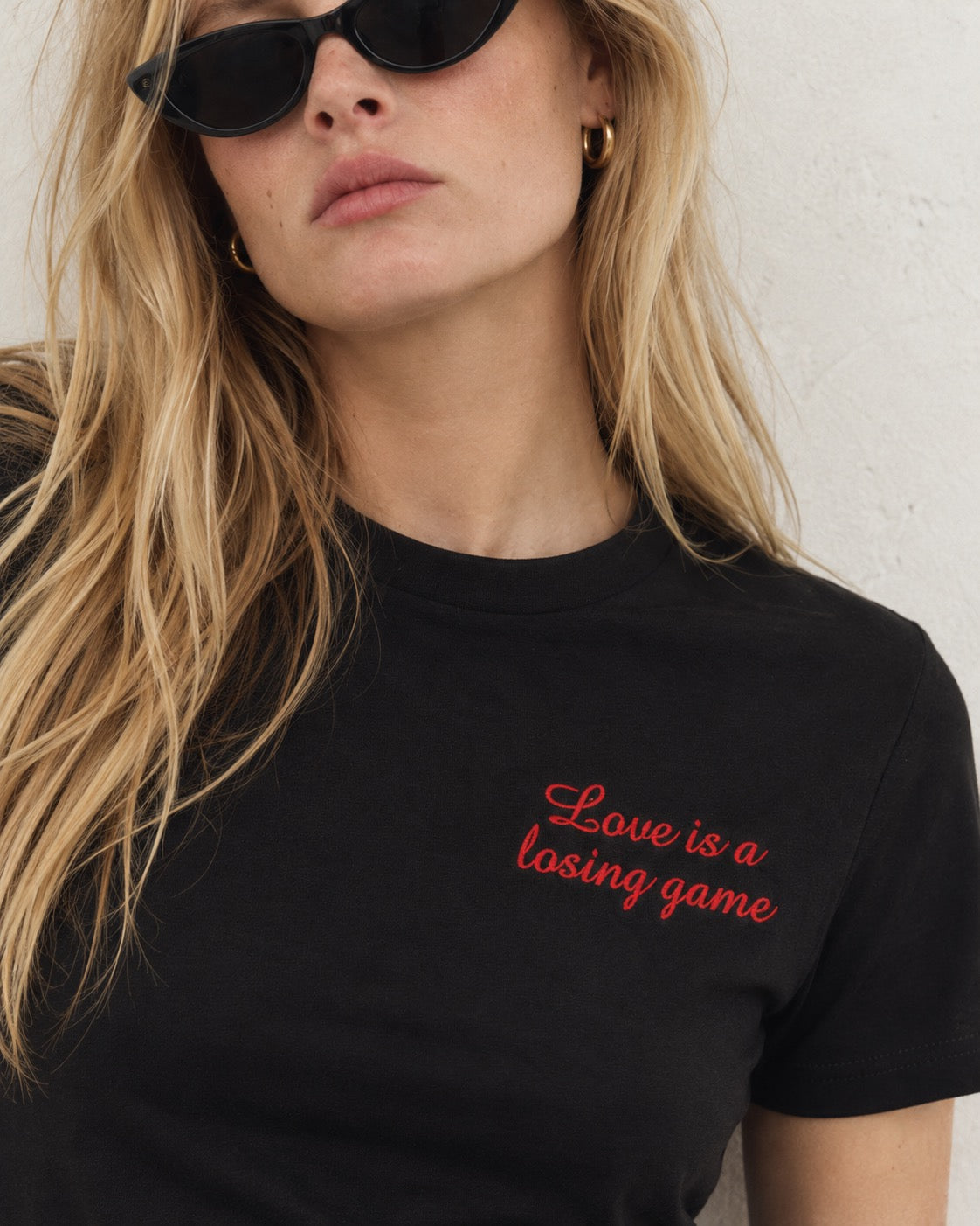 Women's 'LOVE IS A LOSING GAME' left chest embroidered premium organic medium fit 'Muser' t-shirt