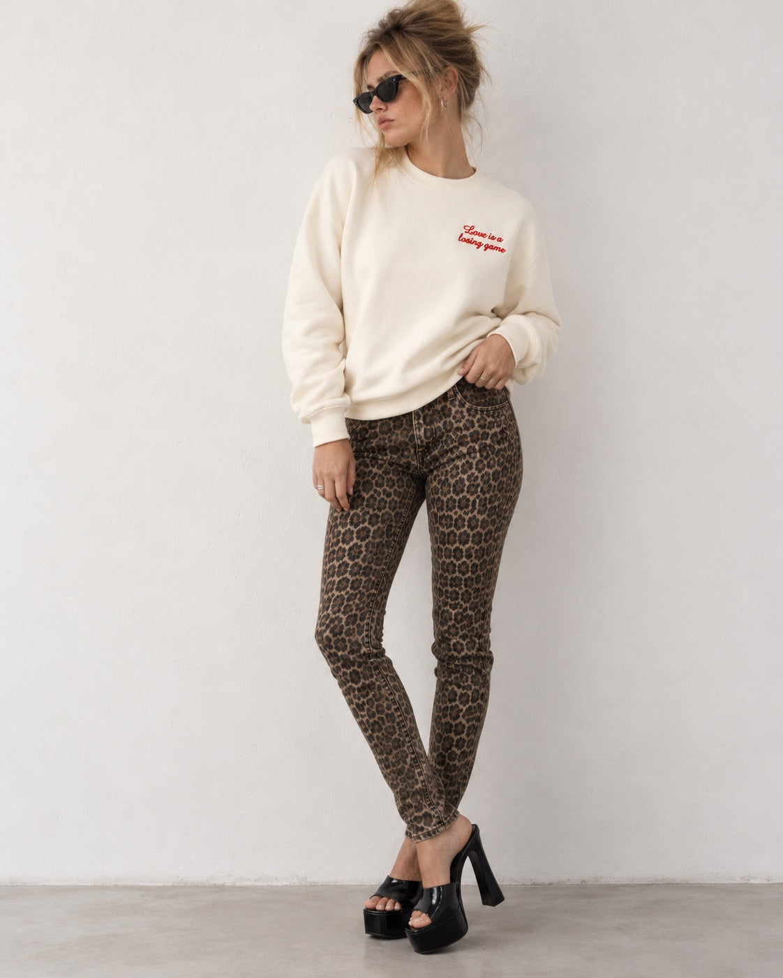 Women's 'LOVE IS A LOSING GAME' left chest embroidered premium organic women's drop shoulder 'Alma' sweatshirt
