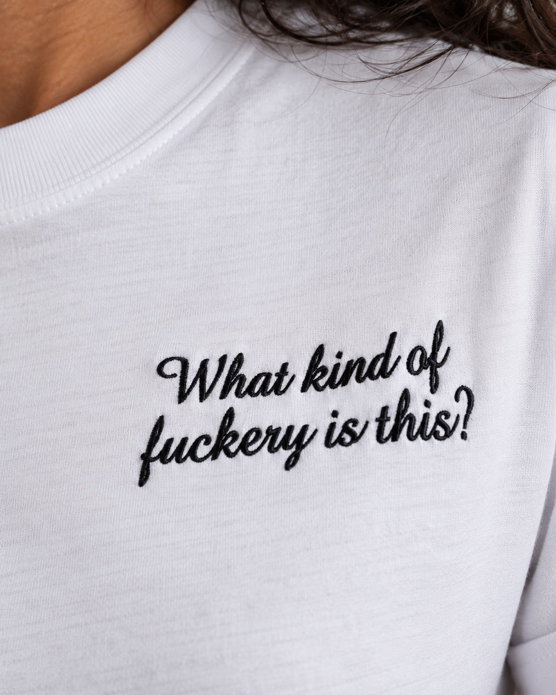 Women's 'WHAT KIND OF F CKERY IS THIS?' left chest embroidered premium organic medium fit 'Muser' t-shirt