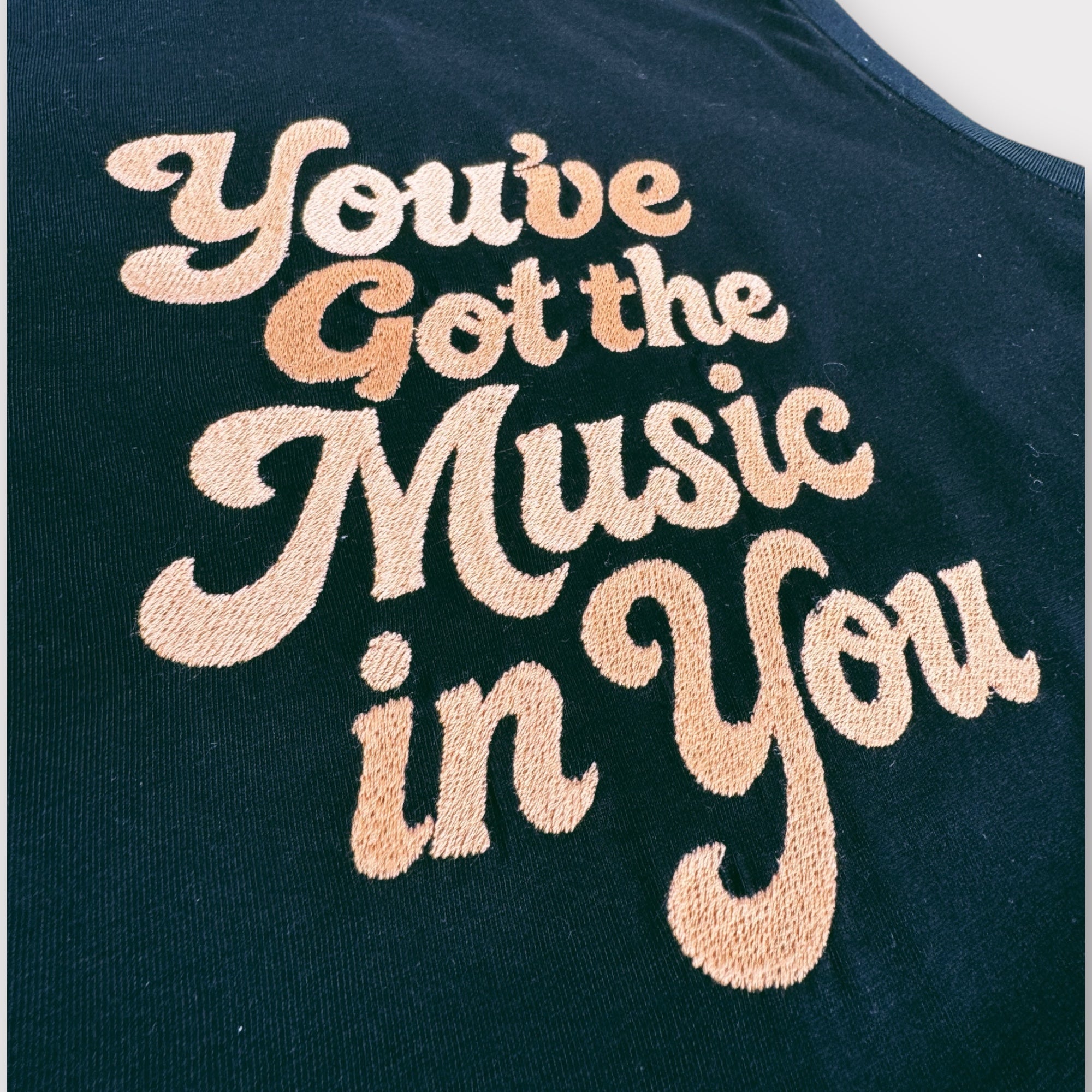 'You've Got The Music In You' 70s typography embroidered premium organic iconic women's sleeveless 'Mia' tank vest top - inspired by Lana Del Rey