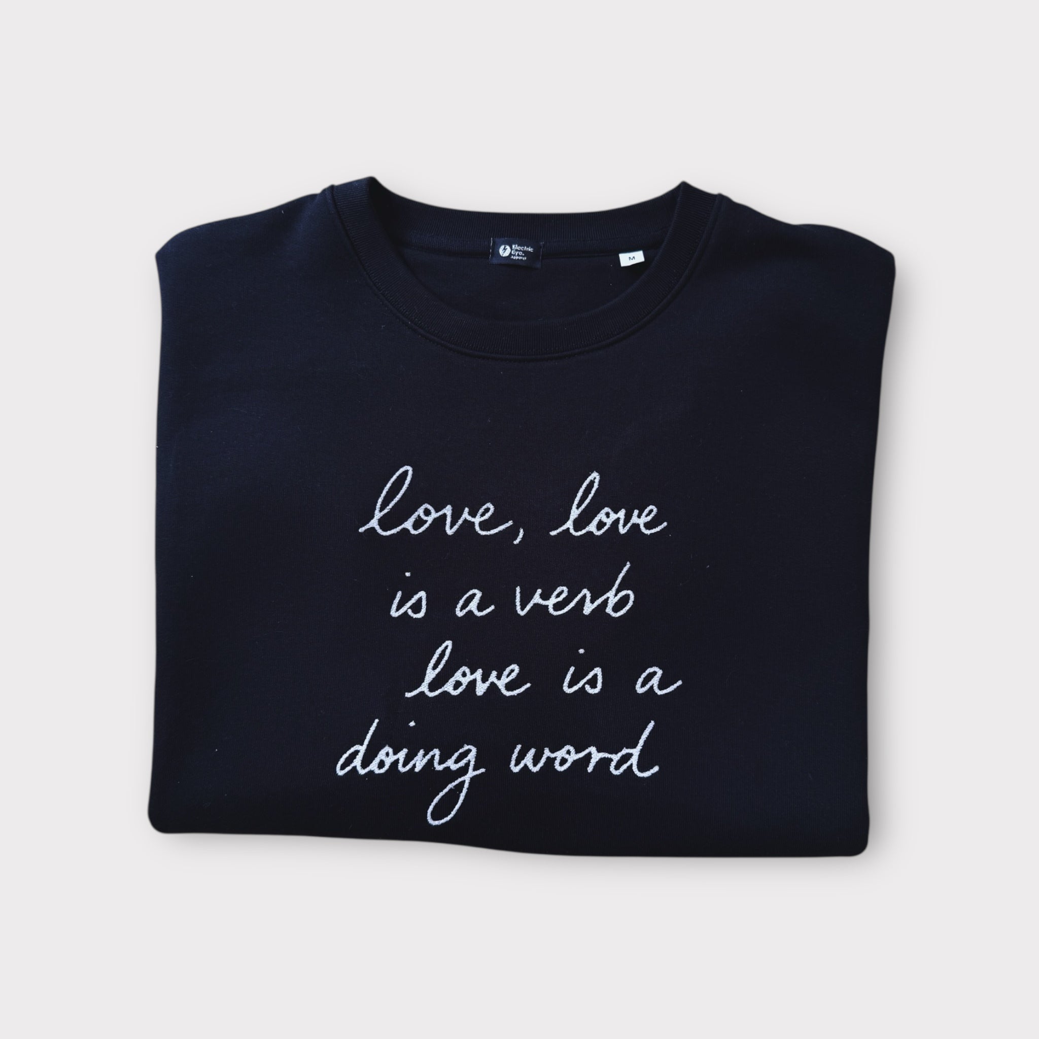 'LOVE, LOVE IS A VERB, LOVE IS A DOING WORD' embroidered organic women's 90s dropped shoulder 'alma' sweatshirt