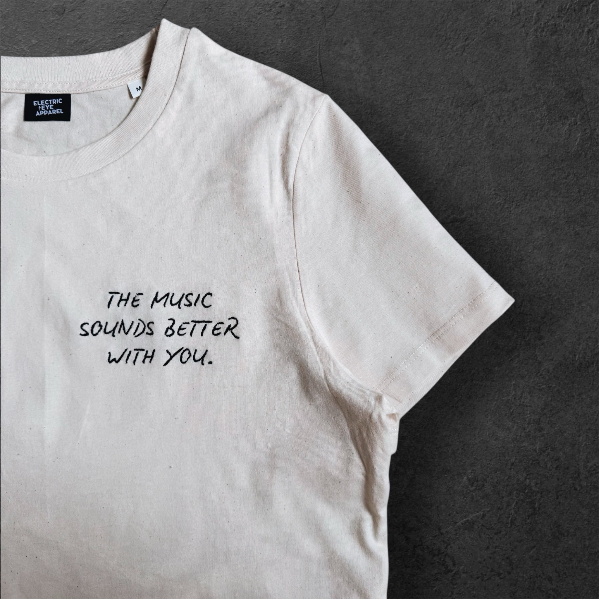 'THE MUSIC SOUNDS BETTER WITH YOU' women's left chest embroidered premium organic medium fit 'Muser' t-shirt