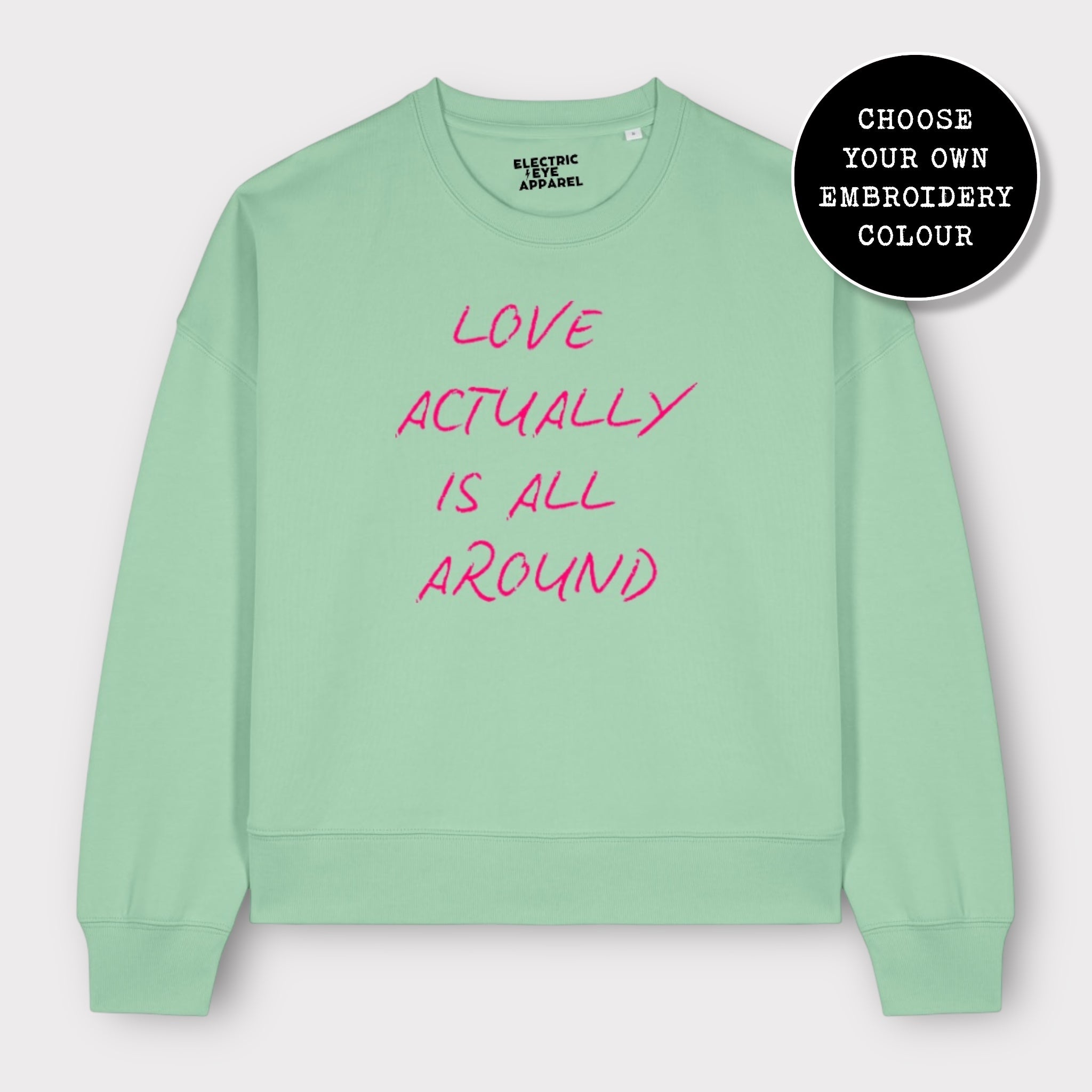 'LOVE ACTUALLY IS ALL AROUND' embroidered organic women's dropped shoulder 'alma' sweatshirt