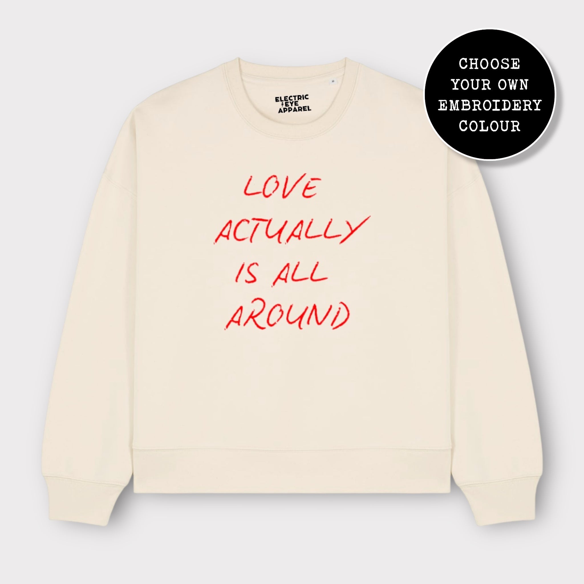 'LOVE ACTUALLY IS ALL AROUND' embroidered organic women's dropped shoulder 'alma' sweatshirt