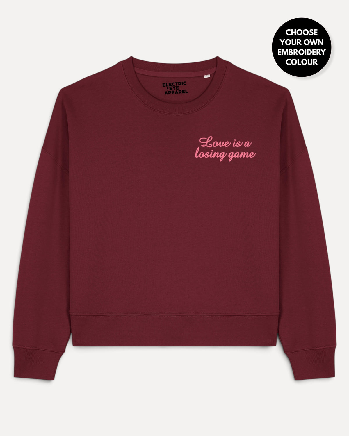 Women's 'LOVE IS A LOSING GAME' left chest embroidered premium organic women's drop shoulder 'Alma' sweatshirt