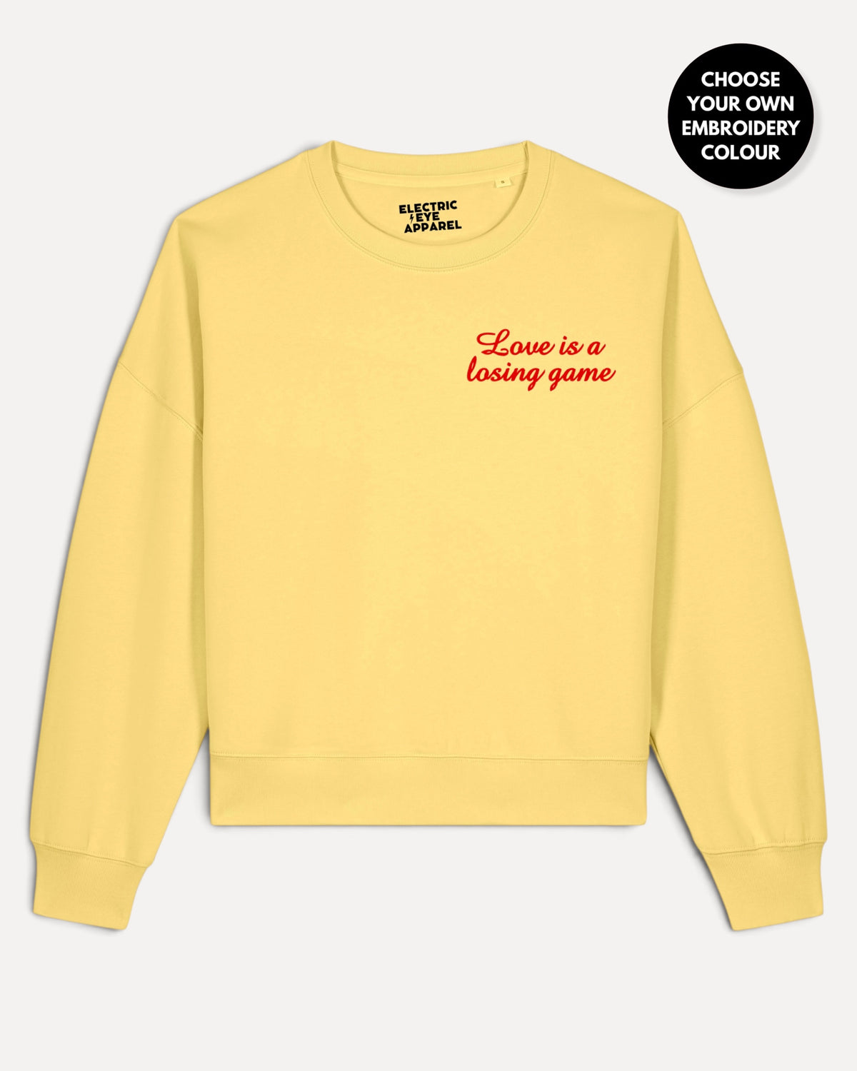 Women's 'LOVE IS A LOSING GAME' left chest embroidered premium organic women's drop shoulder 'Alma' sweatshirt