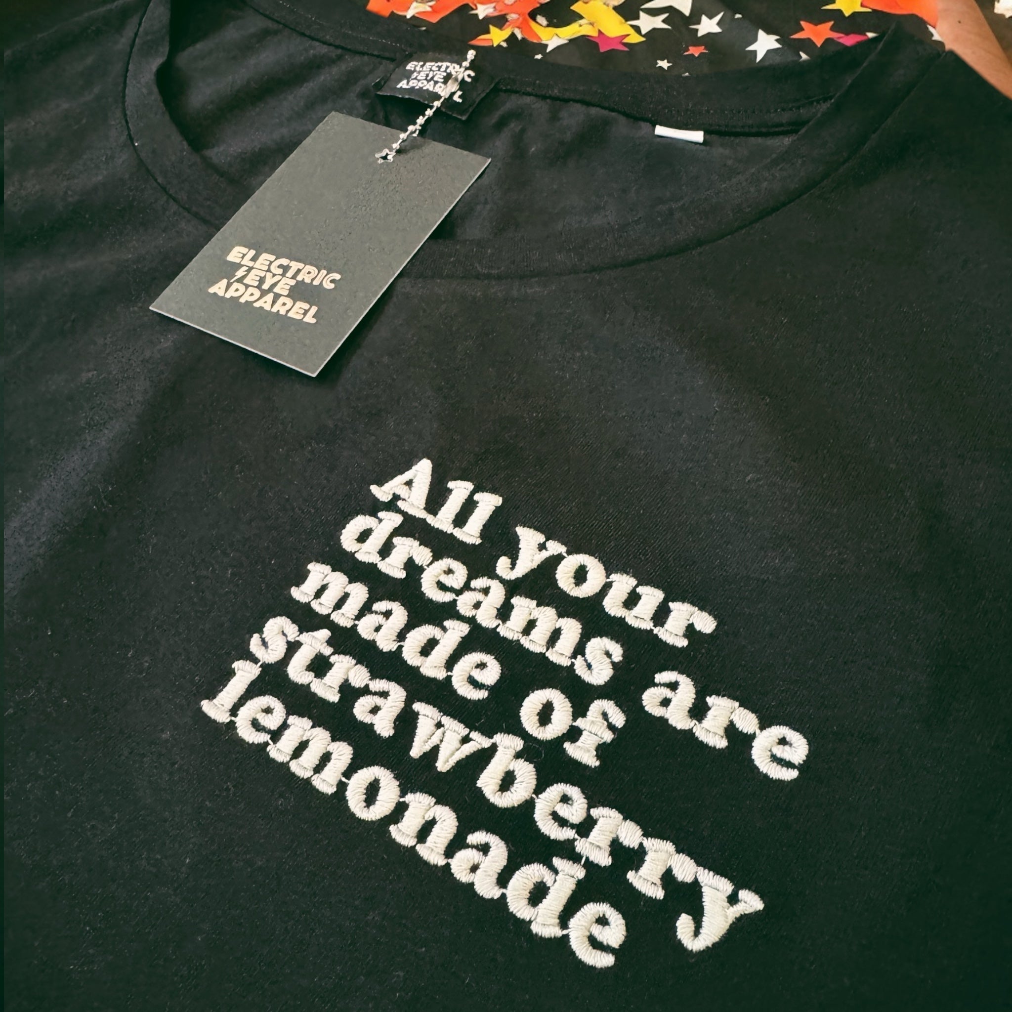 'ALL YOUR DREAMS ARE MADE OF STRAWBERRY LEMONADE' left chest embroidered premium organic iconic mid-light women's 'serena' t-shirt - inspired by Oasis