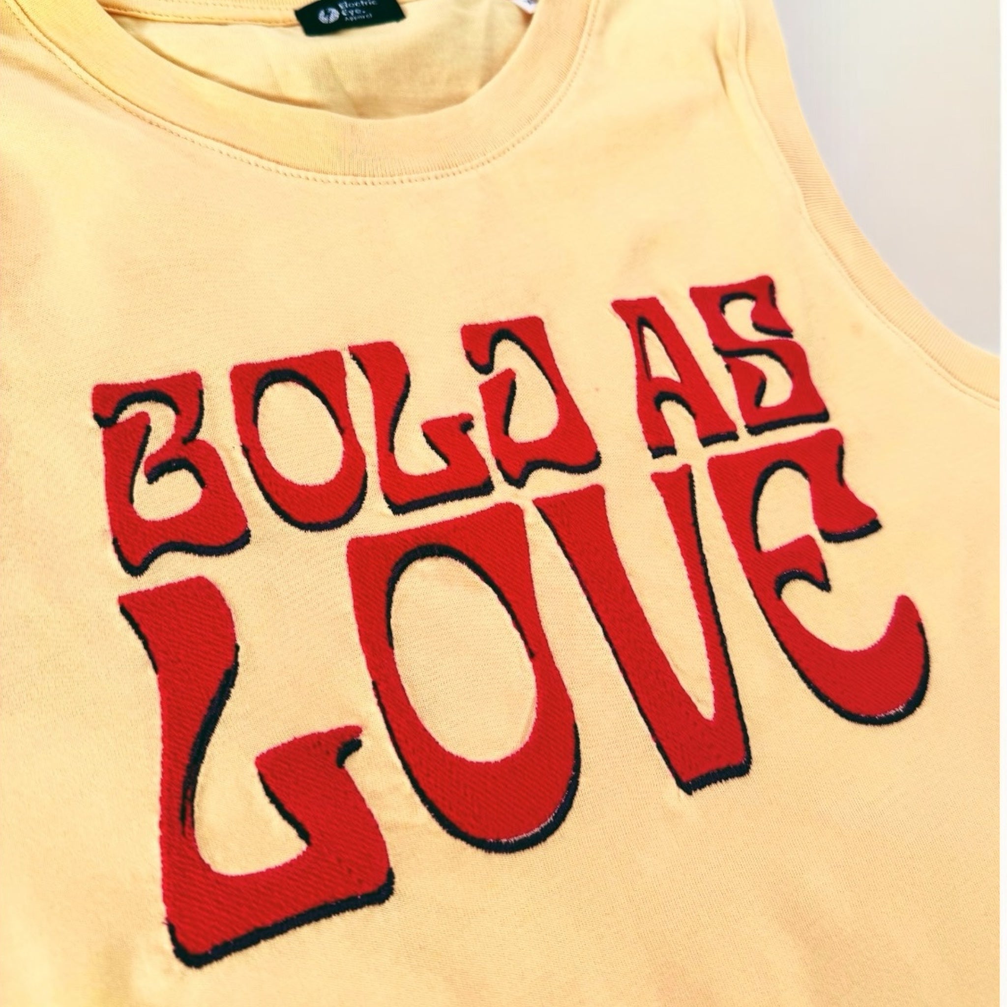 70s style 'BOLD AS LOVE' embroidered premium organic iconic women's sleeveless 'Mia' tank vest top.