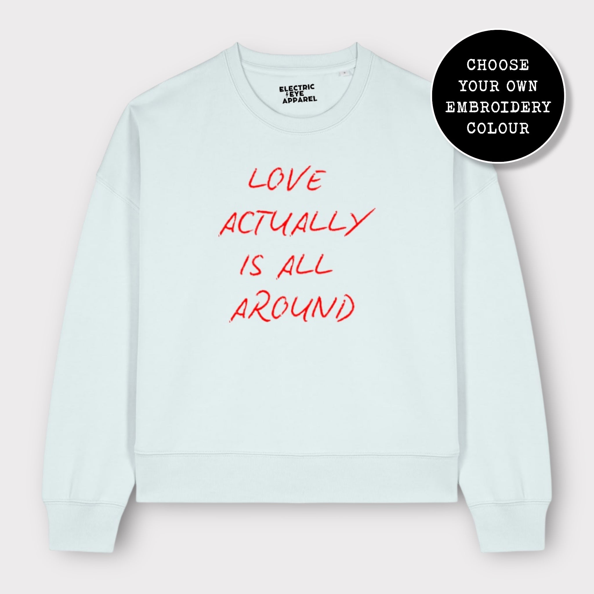'LOVE ACTUALLY IS ALL AROUND' embroidered organic women's dropped shoulder 'alma' sweatshirt