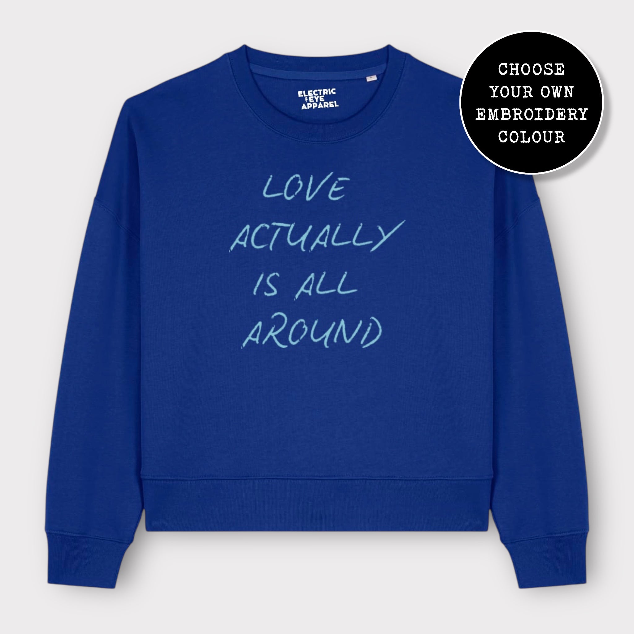 'LOVE ACTUALLY IS ALL AROUND' embroidered organic women's dropped shoulder 'alma' sweatshirt