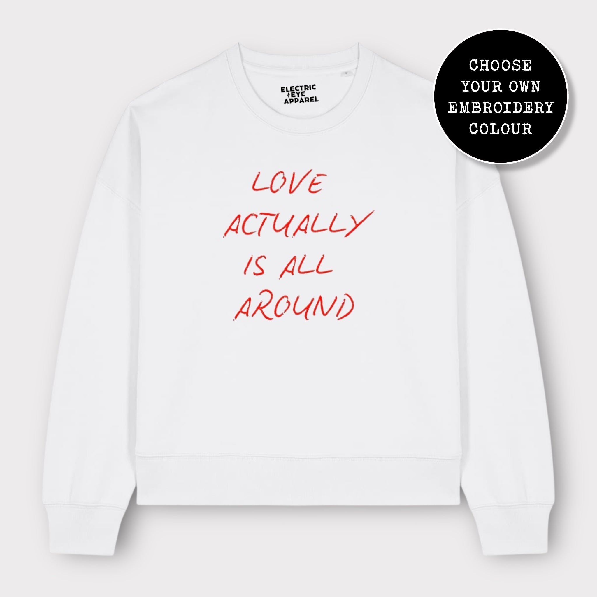 'LOVE ACTUALLY IS ALL AROUND' embroidered organic women's dropped shoulder 'alma' sweatshirt