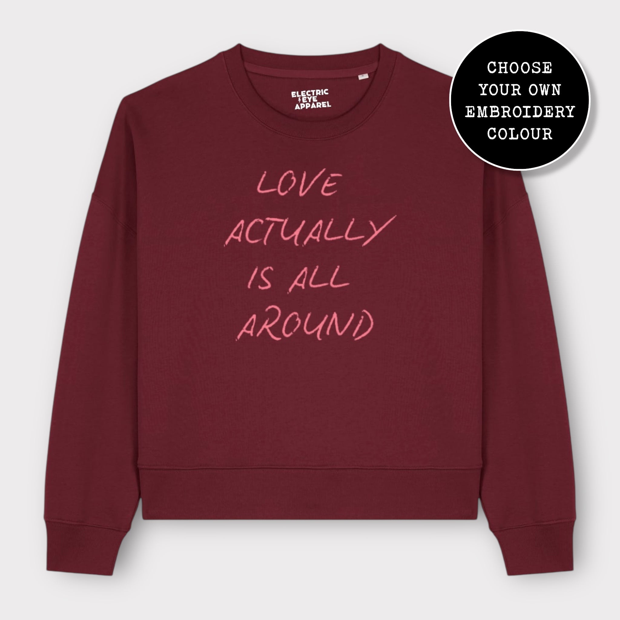 'LOVE ACTUALLY IS ALL AROUND' embroidered organic women's dropped shoulder 'alma' sweatshirt