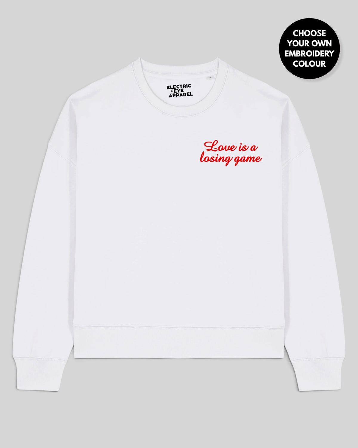 Women's 'LOVE IS A LOSING GAME' left chest embroidered premium organic women's drop shoulder 'Alma' sweatshirt