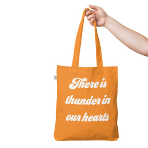 THERE IS THUNDER IN OUR HEARTS Printed Organic fashion tote bag - white text