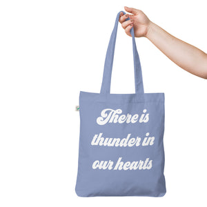 THERE IS THUNDER IN OUR HEARTS 印花有机时尚手提包 - 白色文字