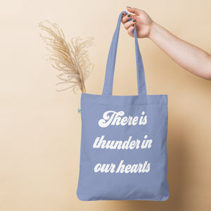 THERE IS THUNDER IN OUR HEARTS Printed Organic fashion tote bag - white text